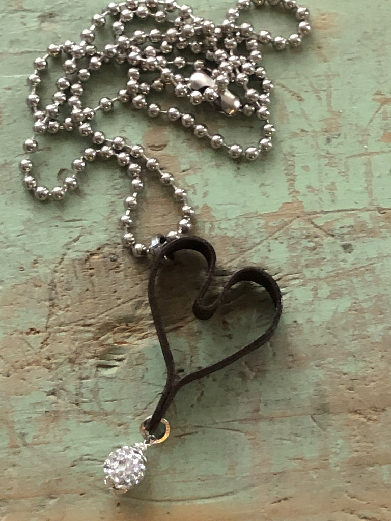 vintage rusty metal heart pendant