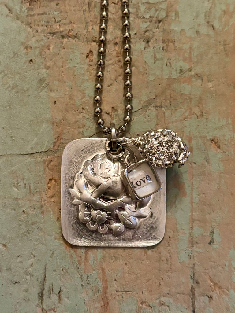 silverplate embossed rose pendant