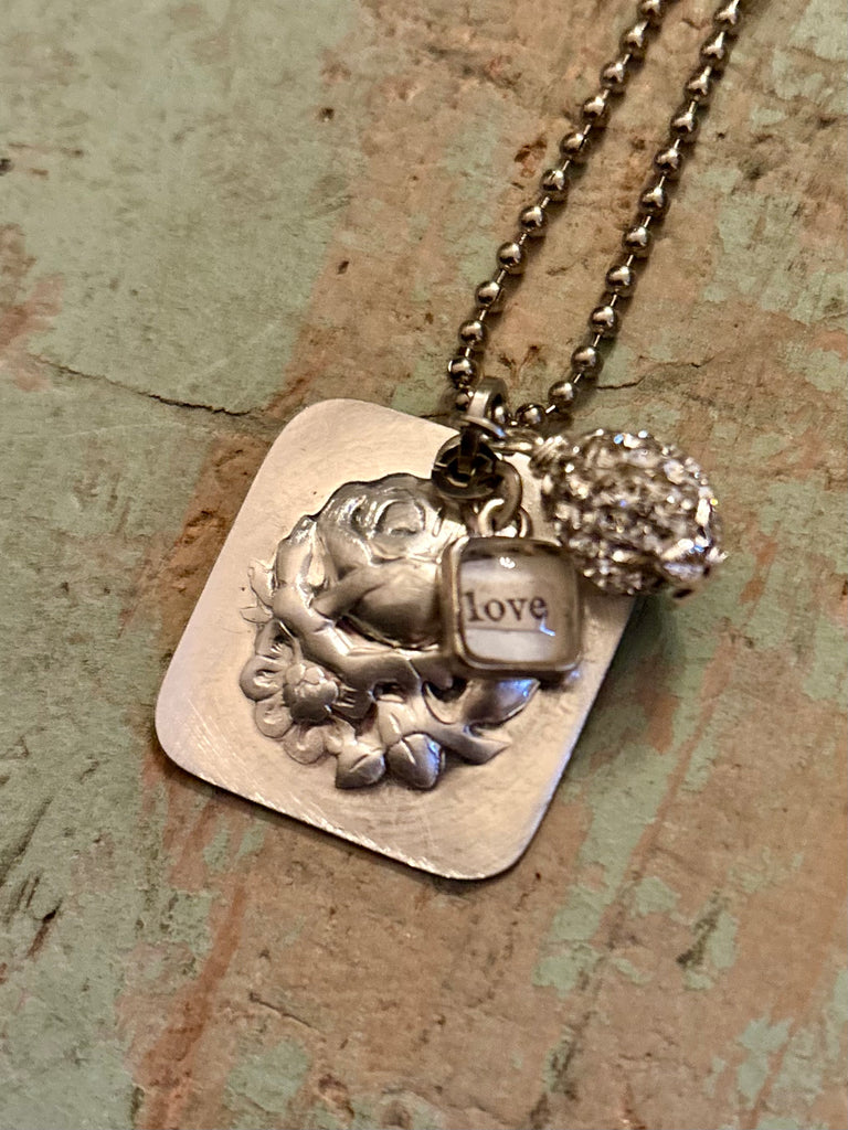 silverplate embossed rose pendant