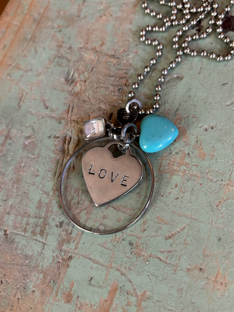 “ optical glass “love” pendant