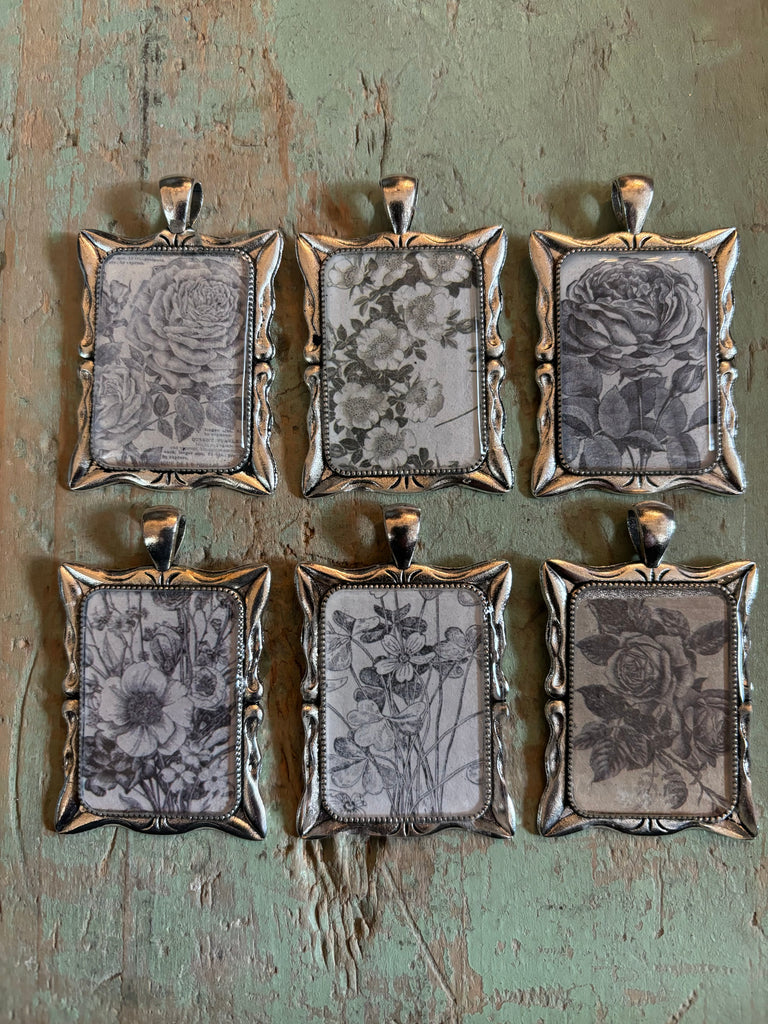 #2 silver plated b/w floral pendant